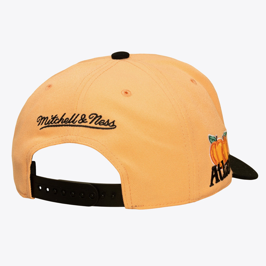 Men's Atlanta Hawks Mitchell & Ness Peach/Black In the City Pro Pinch Snapback Hat